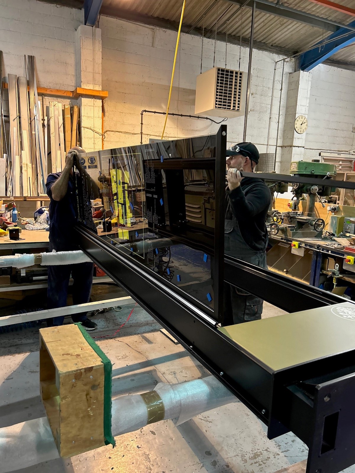 Windsor & Eton Bridge signage being put together in production for the factory